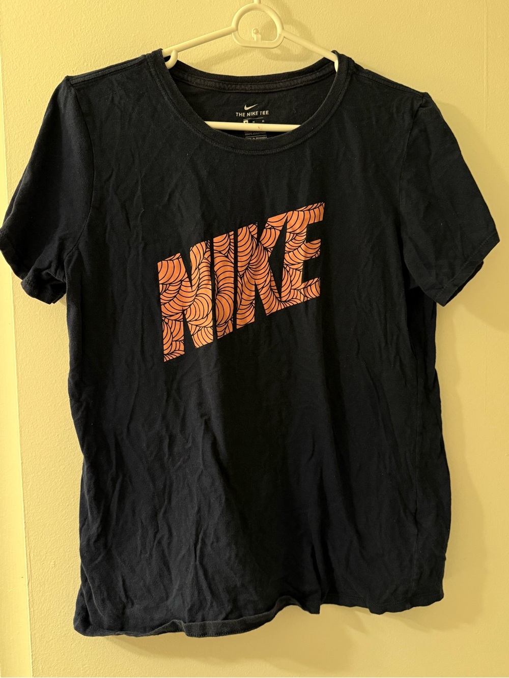 Nike Black Short-Sleeve Tee with Orange Patterned Logo